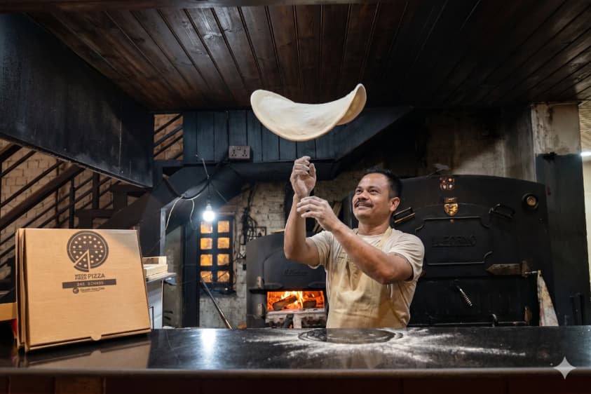 Hand stretched pizza fired in a traditional wood oven at Munch Time Cafe
